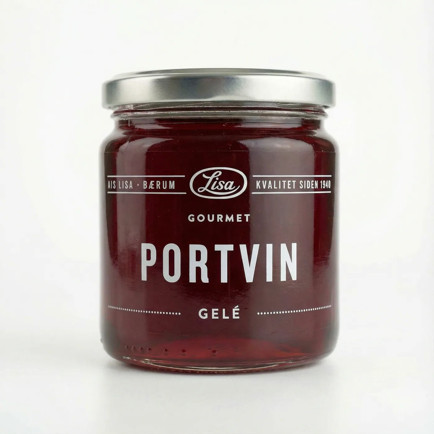 Glass med mørk, blank portvingelé fra Lisa Gourmet, med hvit etikett og gullokk