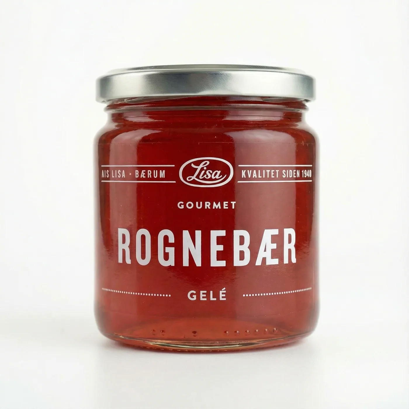 Glass med mørk oransjerød rognebærgelé fra Lisa Gourmet med hvit etikett